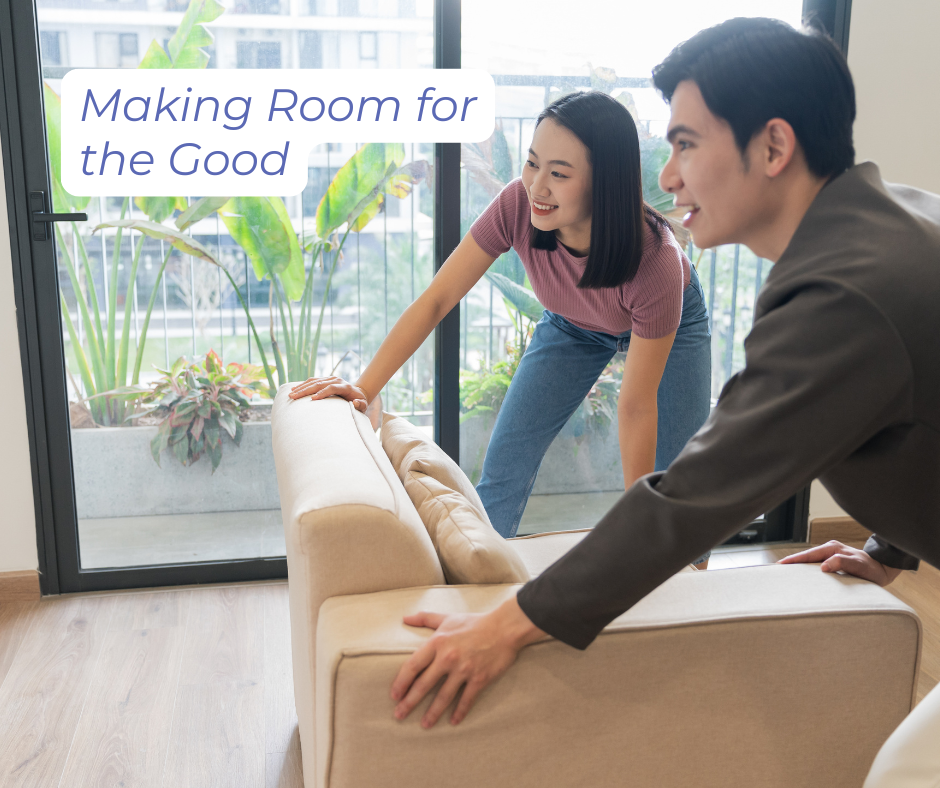 Making Room for the Good: Two people are moving a couch.