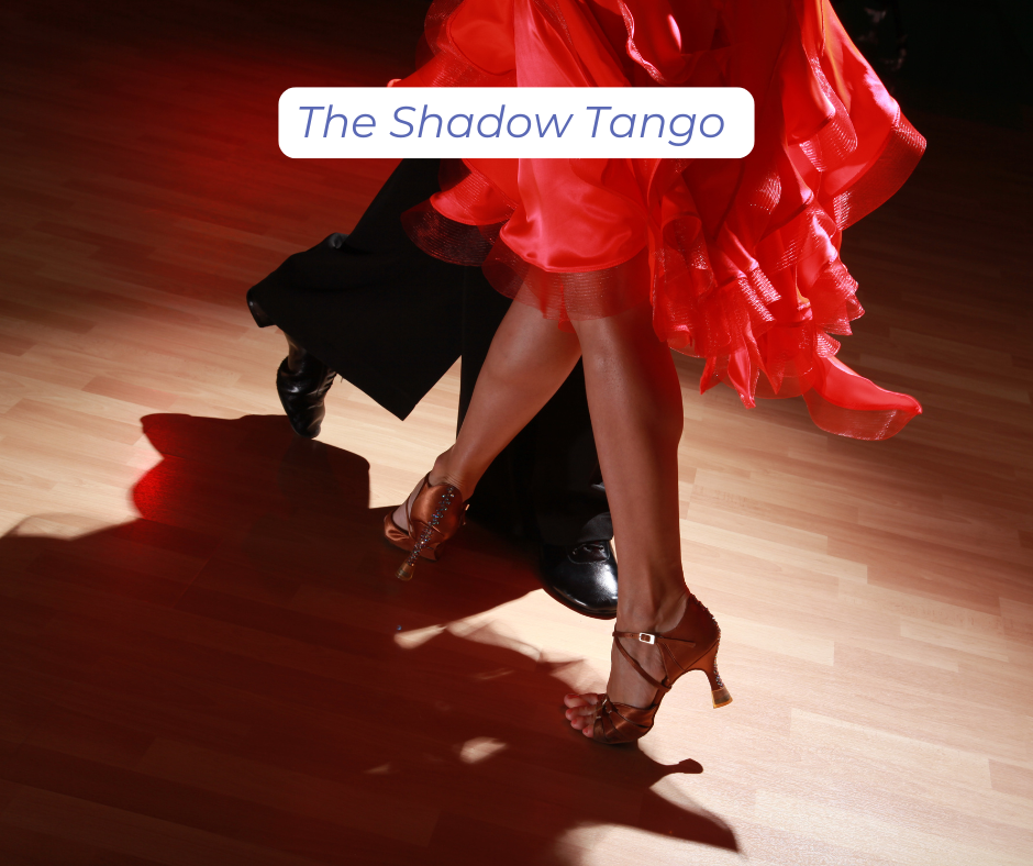A couple dancing the Tango and their shadow
